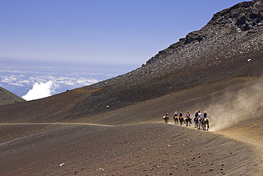 Horse Riding at Crater of Haleakala Volcano, Maui, Hawaii, USA