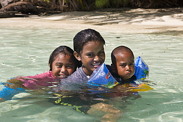 Kids playing in Lagoon, Micronesia, Palau