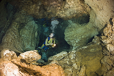 Diver in Chandelier Dripstone Cave, Micronesia, Palau