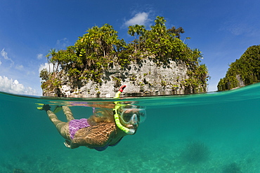 Woman snorkeling in Palau, Micronesia, Palau