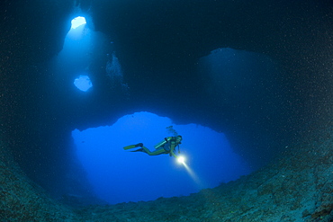 Diver in Blue Hole Cave, Micronesia, Palau