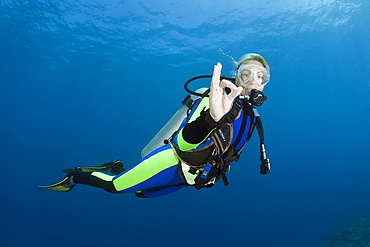 Scuba Diver shows OK signal, Wakaya, Lomaiviti, Fiji, Pacific