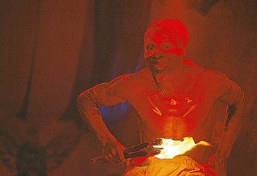 A dancer uses fire to invoke Chango, an African deity of fire, at a festival of Afro-Cuban Culture in Guanabacoa, Cuba