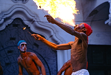 An Afro-Cuban dancer spitting fire at a festival of Afro-Cuban Culture in Guanabacoa just east of Havana, Cuba