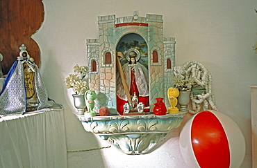 Charms and objects placed on a Santeria altar in a home in the Los Pinos area of Havana, Cubo