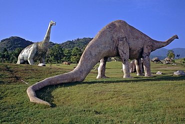 A Brontosaurus grazes at the Valle de la Pre Historia (Parque Bacanao) a dinosaur theme park near Santiago, eastern Cuba, Cuba