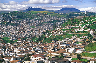 Ecuador's capital and second largest city a view of Quito with Cotopaxi, at 5900 meters, 19,350ft the world's highest active volcano, Quito, Ecuador