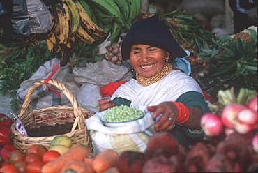 Otavalo, north of Quito is one of Latin Am's most famous markets for textiles, crafts and produce vendors in the produce market, Quito, Ecuador