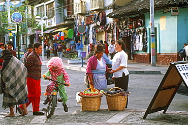 Banos resort and famous hot springs in semitropical area and site of Basilica of Senora de Agua Santa street activity, Highlands, Ecuador