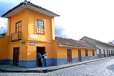 Cuenca World Heritage City & Ecuador's third largest city, famous for its colonial architecture colonial buildings on cobblestone street, Highlands, Ecuador