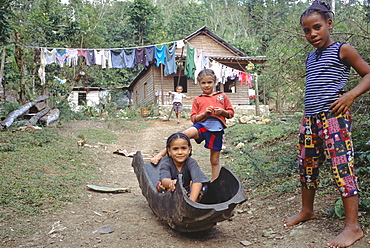 Poor children playing in front of their home in the Province of La Habana in central Cuba, Cuba