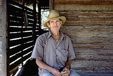 Portrait of a campesino or farmer in his home in Pinar del Rio Province in western Cuba, Cuba