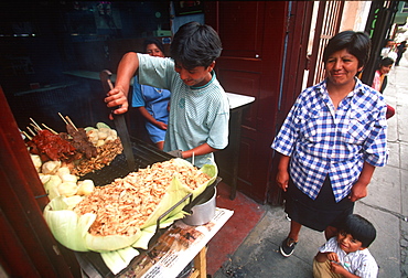 Sidewalk shop serving grilled meat near the Plaza de Armas in the colonial section of the city, Colonial Architecture, Lima, Peru