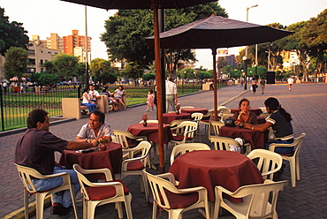 Parque Central, popular gathering spot in busy suburb with upscale banks, shops, homes and sidewalk cafes, Lima, Peru