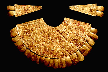 Gold Artifacts Chimu Culture, 1000-1400AD NCoast gold breastplate (pectoral) and two epaulets in the Rafael Herrera Museum, Lima, Peru