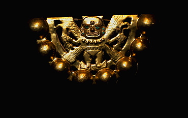 Gold Artifacts Moche (Mochica) Culture, 100 to 700AD, NCoast gold rattle from Lord of Sipan Tomb, 300AD, represents 'Decapitator' Moche supreme deity, Peru