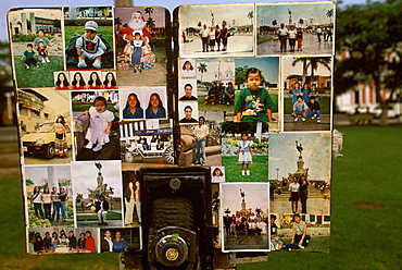 A colonial city with an attractive Plaza de Armas in the heart of the city traditional photographer with camera and photos, Trujillo, North Coast, Peru