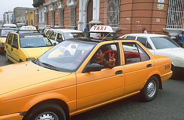 A colonial city on Peru's north coast a traffic jam with cabs in the colonial heart of the city around the Plaza de Armas, Trujillo, Peru