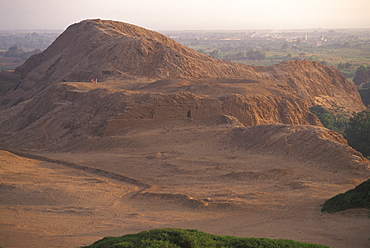 Mochica Culture La Huaca del Sol (Temple of the Sun) built in 100-700AD world's largest adobe structure (1/3 of original size) pyramid and landscape, Peru