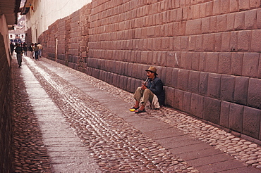 The ancient capital of the Incas Callejon Loreto a street near the Plaza de Armas with Inca foundations below colonial buildings, Cuzco, Highlands, Peru