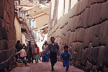 Ancient Inca capital Calle Hatunrumiyoc near the Plaza de Armas has some of the most finely constructed Inca walls, Cuzco, Peru