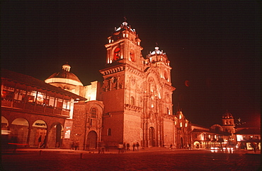 The Plaza de Armas, in the old colonial city with La Compania Church, at night its foundations are from an Inca Palace, Cuzco, Highlands, Peru