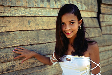 This teenage girl is a quinceanera about to celebrate her 15th birthday (quince anos) in rural Barigua east of Baracoa, Eastern Cuba, Cuba