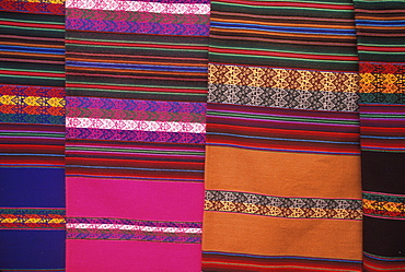 Pisac village in Sacred Valley of the Incas near Cuzco and famous for one of the world's most colorful markets traditional textiles, Highlands, Peru