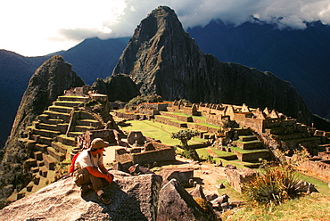 Machu Picchu view of the ancient city with Huayna Picchu Peak above the Rio Urubamba hikers viewing site from end of Inca Trail, Highlands, Peru