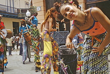 Steet entertainers in costume and on stilts entertaining passersby in Habana Vieja, Havana, Cuba