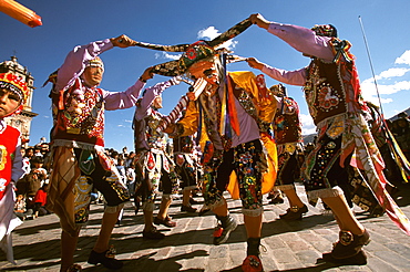 Corpus Christi is one of Peru's most famous festivals, costumed dancers perform the colonial mestizo Cholo in Plaza de Armas, Cuzco, Peru