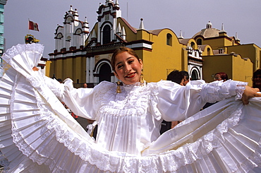 A colonial city on Peru's north coast the Tribute to the Flag Parade on Plaza de Armas dancer in colonial dress typical of Trujillo, Trujillo, Peru