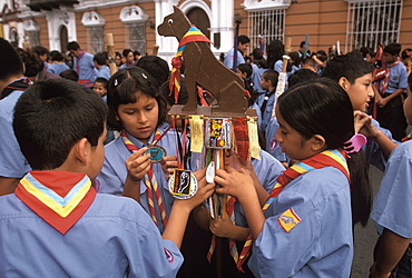 A colonial city on Peru's north coast the Tribute to the Flag Parade on Plaza de Armas boy and girl scout groups, Trujillo, Peru