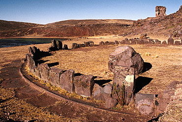 Aymara Culture 1000AD, pre-Inca observatories at Sillustani near Puno, chullpa tombs on hillside beyond, Lake Titicaca, Peru