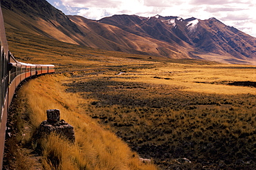 The famous railroad that climbs from Cuzco at 11,000 to Puno at 14,000 on Lake Titicaca, Altiplano, Peru