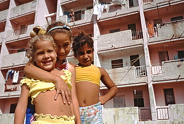 Children playing in front of an apartment house in the Habana Libre area of Havana, Cuba