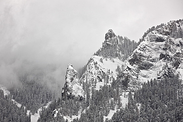 Snow-covered mountains covered with fog, Ouray County, Colorado, United States of America, North America