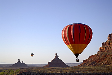 Formations in Valley of the Gods with two hot air balloons, near Mexican Hat, Utah, United States of America, North America