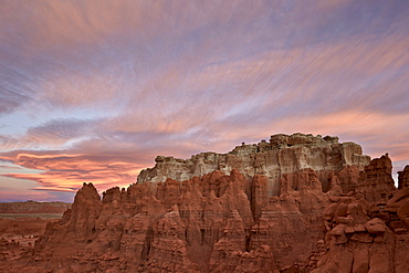 Orange clouds at dawn over the badlands, Goblin Valley State Park, Utah, United States of America, North America 