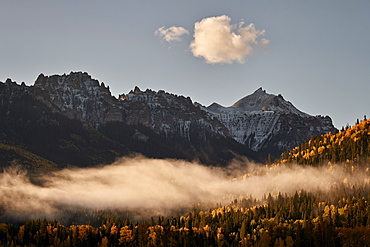 Snow-covered mountain in the fall with fog, Uncompahgre National Forest, Colorado, United States of America, North America