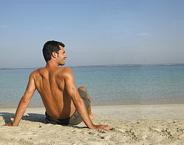 Man sitting on beach