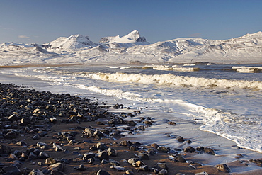 Beach at Brot near Bakkagerdi in Borgarfjordur Eystri fjord, Mount Dyrfjoll (Door mountain), 1136m, in background, East Fjords, Iceland, Polar Regions