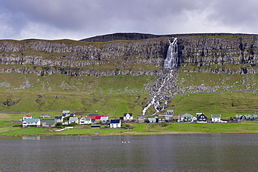 Houses at Sandur, across Sandsvatn lake, Sandoy, Faroe Islands (Faroes), Denmark, Europe