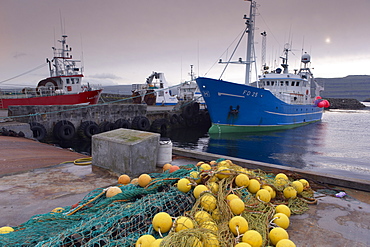 Trawler and fishing nets in Toftir harbour, Toftir, Eysturoy, Faroe Islands (Faroes), Denmark, Europe