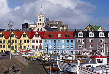 Colourful boats and picturesque gabled buildings along the quayside in Vestaravag harbour, Torshavn, Streymoy, Faroe Islands (Faroes), Denmark, Europe