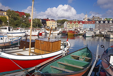 Colourful boats and picturesque gabled buildings along the quayside in Vestaravag harbour, Torshavn, Streymoy, Faroe Islands (Faroes), Denmark, Europe