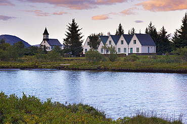 Thingvellir national church and Thingvallabaer, a five-gabled farmhouse, official summer residence of Iceland's Prime Minister, on the banks of River Oxara, Thingvellir National Park, UNESCO World Heritage Site, south-west Iceland (Sudurland), Iceland, Polar Regions