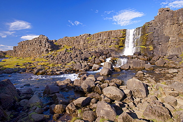 Oxara River tumbles down the Almannagja cliff face at Oxarafoss, Thingvellir National Park, UNESCO World Heritage Site, south-west Iceland (Sudurland), Iceland, Polar Regions