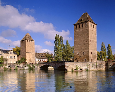 The Ponts-couverts (Covered-bridges) dating from the 14th century, and two of the three defensive towers over river Ill, part of the Grande Ile, UNESCO World Heritage Site, Strasbourg, Alsace, France, Europe