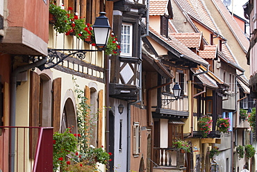 Street in the heritage village of Eguisheim, Alsatian Wine Road, Haut Rhin, Alsace, France, Europe